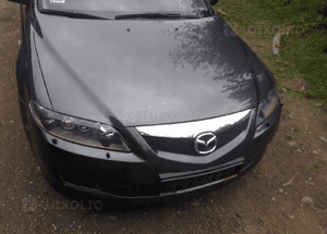 Mazda 6 02-07 Maska lampa zderzak pas atrapa 32G 1