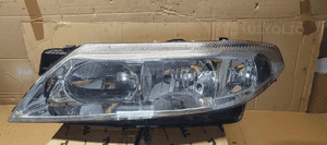 Lampa lewy przód przednia lewa Renault Laguna II Nowa TYC 20-0158-05-2 2