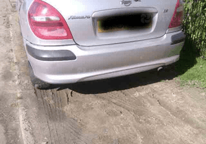 Nissan Almera N16 N 16 zderzak tyl tylny 2