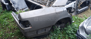 Mercedes 124 sedan  błotnik PRAWY okular dupa tył poszycie 2
