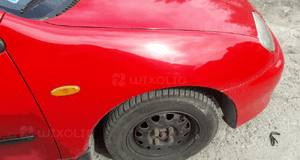 Mazda 323 323C BA 94-98 Błotnik prawy przedni przód w kolor SU 2