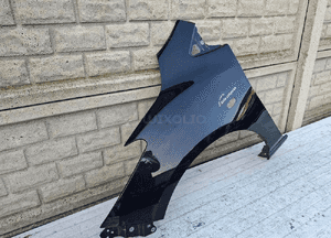 Błotnik przedni lewy mazda 2 ii 2007-14 2