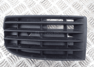 KRATKA RAMKA HALOGENU LEWA VW GOLF V 1K0853665 1