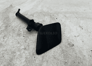 Spryskiwacz lampy lewy 31283734 volvo V40 ii 2