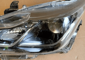 Lampa lewa reflektor lewy toyota corolla E21 sedan led 19- 2
