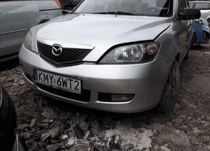 Mazda 2 02-07 DY  Maska zderzak pas lampa atrapa  zamek szyba klapa w kolor 22V 1