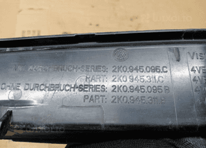Osłona zaślepka lampy lewy tył VW Caddy III 2K0945311C 2K0945095C 6