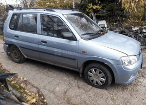 Mazda Demio  99-03 LIFT Maska lampa zderzak pas atrapa 6