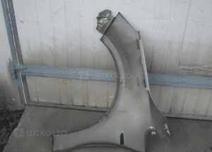 Błotnik prawy przód Opel Astra J IV 4 6