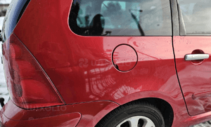 Peugeot 307 blotnik tyl tylny lewy prawy  SW kombi 11