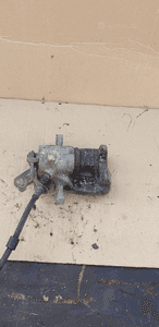 Zacisk hamulcowy lewy tył tylny VW Golf V 4