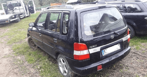 Mazda Demio 97- Maska lampa zderzak pas atrapa 16W 4