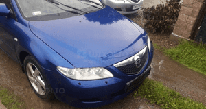 Mazda 6 02-07 Maska lampa zderzak pas atrapa 25B 7
