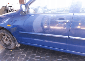VW Polo 97 drzwi przod przednie lewe LA5E 1
