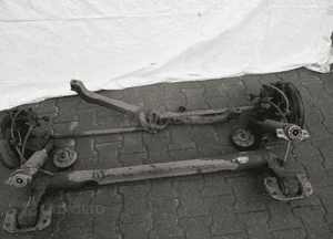 OPEL ASTRA IV J OŚ BELKA ZAWIESZENIE TYŁ 5X115 13