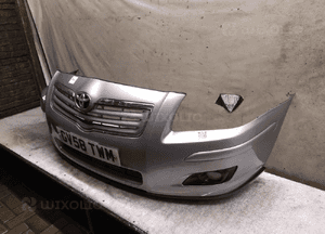 Zderzak przód przedni do toyota avensis T25 lift 1F7 srebrny halogeny 2