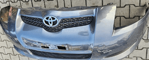 Toyota Auris I 1 zderzak przód przedni grill 5
