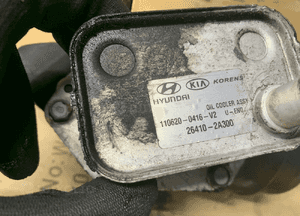 Podstawa obudowa filtra oleju chłodniczka Hyundai IX35 1.7 CRDI K01-00200 26410-2A300 5