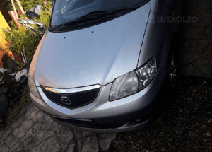 Mazda MPV 99-06 Maska lampa zderzak pas atrapa 7