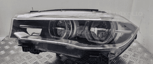 Bmw F15 F16 lampa prawa przód 7494118 km 2