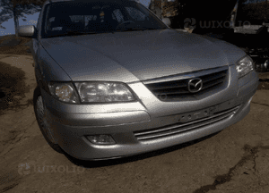 Mazda 626 GF GW 97-02   Maska lampa zderzak pas atrapa 18G 22V 9