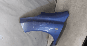 Nissan micra K12 błotnik przód przedni lewy T12 błękitny 2