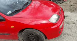 Mazda 323 323C BA 94-98 Błotnik prawy przedni przód w kolor SU 1