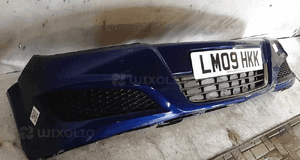 Zderzak przód przedni do opel astra h 3 iii lift fl Z21B granatowy uszkodzony dół 4