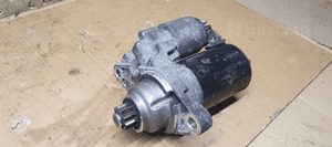 Rozrusznik starter silnika VW FOX 1.2 02T911023G 0001120400 2