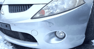 Mitsubishi Grandis zderzak przód przedni grill halogen A19 2