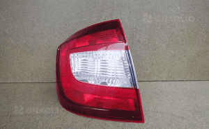 Lampa lewa tylna tył skoda rapid fl liftback 5J 1