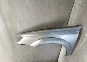Subaru Outback III 3 LIFT PRZEDNI BŁOTNIK LEWY 06-09R SREBRNY 2