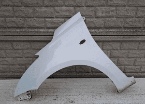 SUZUKI SWIFT Mk7 10-17 BŁOTNIK PRZEDNI LEWY 1