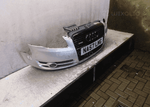 Audi A4 B7 zderzak przód przedni halogeny LY7W srebrny 5
