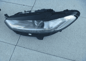 Trójkąt błotnika prawy lewy mondeo MK5 DS73-F16004 13