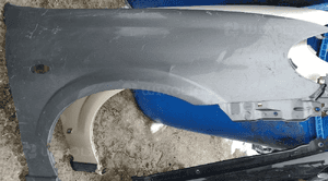 Nissan Almera N16 blotnik przod przedni prawy 2