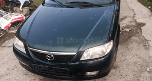 Mazda 323 323f BJ 98-03 Lift  Maska lampa zderzak pas atrapa 18J 2