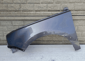 HONDA E ELEKTRYK BŁOTNIK PRZEDNI LEWY 1