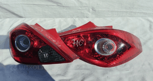 Lampa tylna tył prawa lewa opel corsa d 3D 13211840 13211841 1