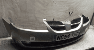 Zderzak przód przedni nissan almera N16 lift fl KY0 srebrny halogeny 3