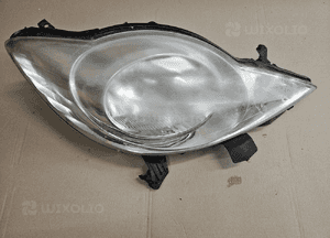 Peugeot 107 lampa przód przednia lewa EU 9