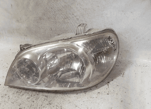 Lampa przednia lewa przód lewo kia carnival 2 3