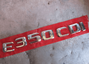 MERCEDES ML E 350 cdi emblemat na klapę  logo literki cyfry 4 matic 1