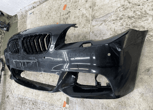 Bmw F10 m lift oryginalny zderzak przedni naprawiany 2