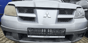 Mitsubishi Outlander I 1 zderzak przód przedni grill  A31 1