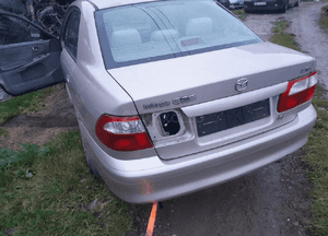Mazda 626 GF GW 97-02 LIFT    Maska lampa zderzak pas atrapa zamek mocowanie  kolor 4F 8
