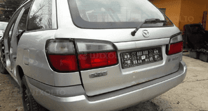 Mazda 626 GW 97-02 KOMBI Zderzak tylny tył pas hak szyba drzwi w kolor 22V 5