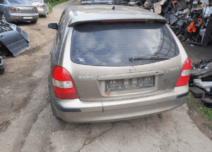 Mazda 323 323f BJ 98-03  Maska lampa zderzak pas atrapa 12M 5