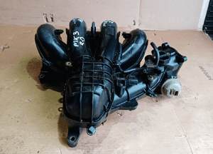 Kolektor ssący Ford Mondeo MK3 2.0 16V 1S7G-9424-DC 2
