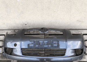 ZDERZAK PRZÓD PRZEDNI TOYOTA YARIS II 2 2005- 52119-0D130 CAŁY 1